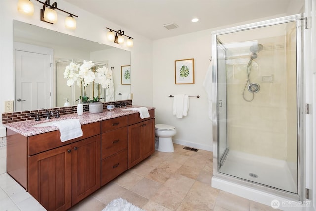 13063 SE 47th Pl, Bellevue, WA 98006 - bathroom with double vanity, a stall shower, and recessed lighting