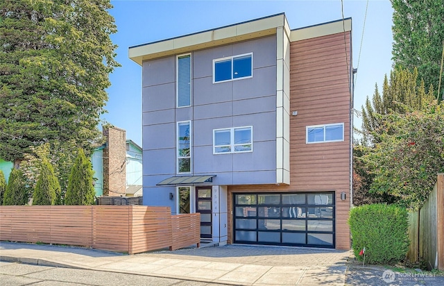 9544 3rd Ave NW, Seattle, WA 98117 - contemporary house featuring an attached garage and driveway