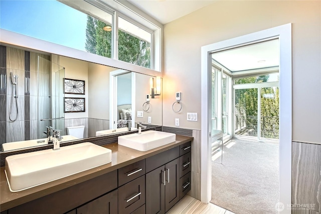 9544 3rd Ave NW, Seattle, WA 98117 - full bathroom featuring double vanity and plenty of natural light