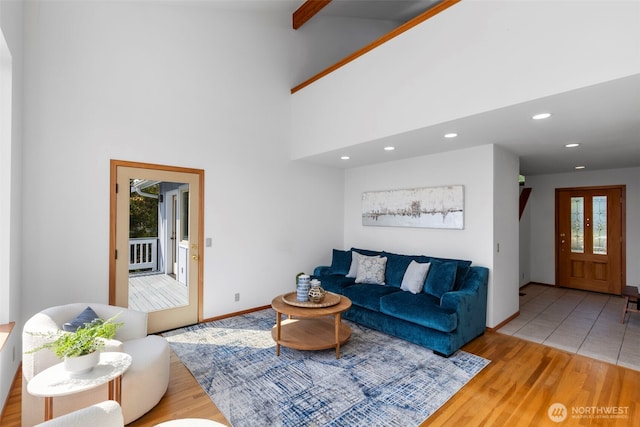 252 Myrtle St, Port Townsend, WA 98368 - living area featuring plenty of natural light, wood finished floors, recessed lighting, and a towering ceiling