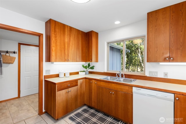 252 Myrtle St, Port Townsend, WA 98368 - kitchen with dishwasher, light countertops, brown cabinetry, light tile patterned floors, and recessed lighting