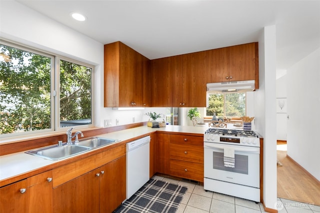 252 Myrtle St, Port Townsend, WA 98368 - kitchen with white appliances, under cabinet range hood, light countertops, healthy amount of natural light, and recessed lighting