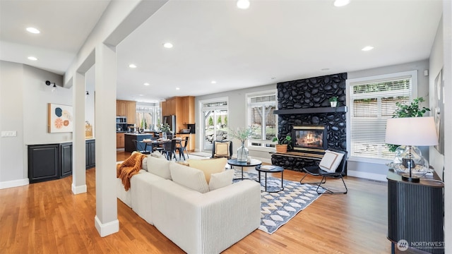 23728 135th Pl SE, Kent, WA 98042 - living area featuring a fireplace, light wood-type flooring, and recessed lighting
