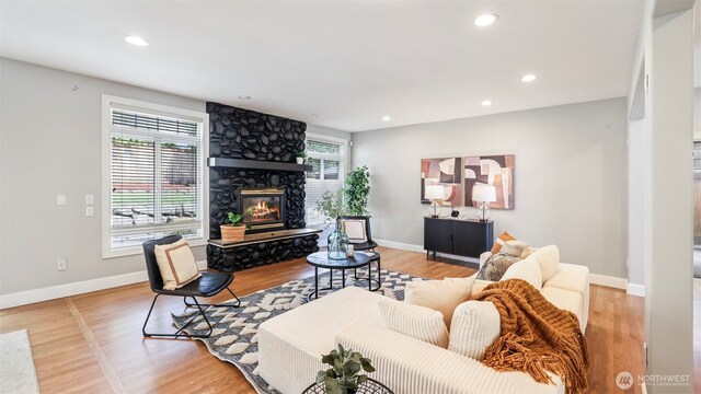 23728 135th Pl SE, Kent, WA 98042 - living room featuring light wood-style flooring, a fireplace, and recessed lighting