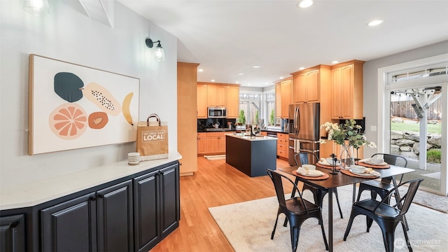 23728 135th Pl SE, Kent, WA 98042 - dining area with light wood-style flooring and recessed lighting