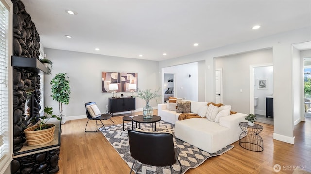23728 135th Pl SE, Kent, WA 98042 - living area featuring a large fireplace, light wood-style floors, and recessed lighting