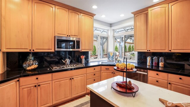 23728 135th Pl SE, Kent, WA 98042 - kitchen featuring stainless steel appliances, recessed lighting, light brown cabinetry, tasteful backsplash, and dark countertops
