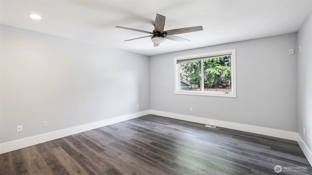 23728 135th Pl SE, Kent, WA 98042 - spare room featuring a ceiling fan, dark wood-style flooring, and recessed lighting