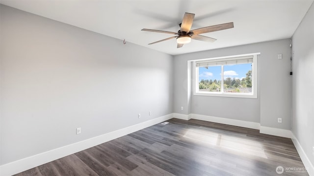 23728 135th Pl SE, Kent, WA 98042 - unfurnished room featuring a ceiling fan and dark wood-style floors