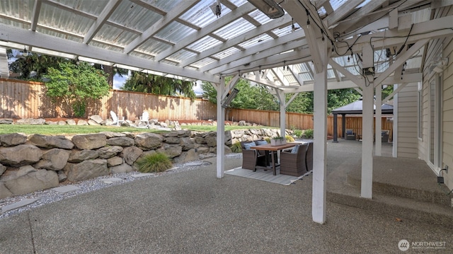 23728 135th Pl SE, Kent, WA 98042 - fenced backyard with outdoor dining space, a patio area, a pergola, and a gazebo