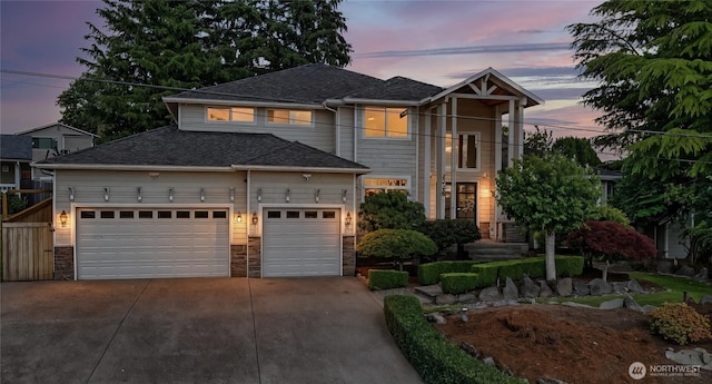 23728 135th Pl SE, Kent, WA 98042 - view of front facade with concrete driveway, a garage, a shingled roof, and stone siding