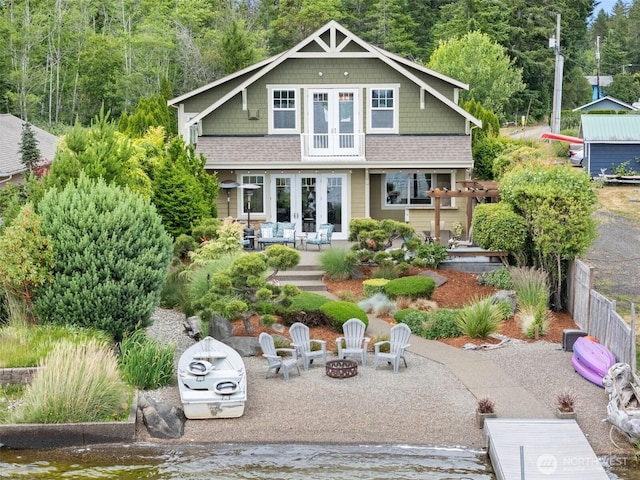 102 E Gibler Ln, Shelton, WA 98584 - rear view of property featuring french doors, an outdoor fire pit, a patio, and a wooden deck