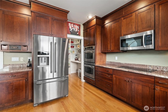 102 E Gibler Ln, Shelton, WA 98584 - kitchen featuring stainless steel appliances, light wood-style flooring, light stone counters, and recessed lighting