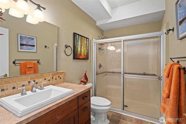 102 E Gibler Ln, Shelton, WA 98584 - bathroom with a shower stall, vanity, and decorative backsplash