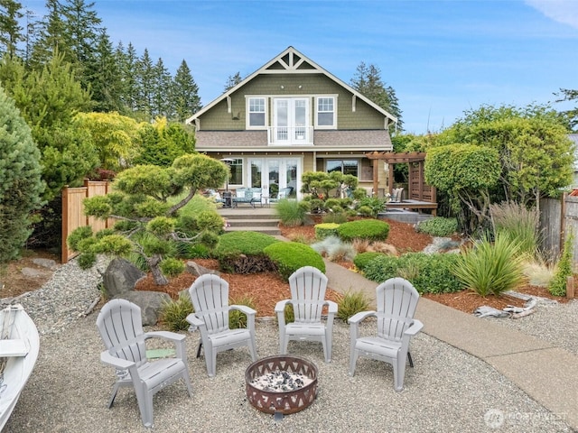 102 E Gibler Ln, Shelton, WA 98584 - rear view of property with french doors, a fire pit, and a wooden deck