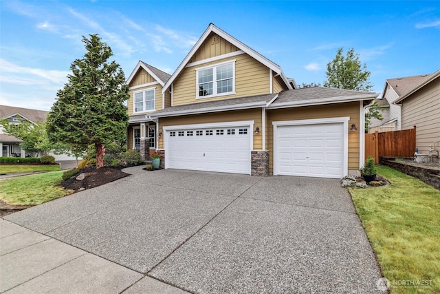 22418 SE 281st St, Maple Valley, WA 98038 - view of front of home with board and batten siding, concrete driveway, a garage, stone siding, and a shingled roof