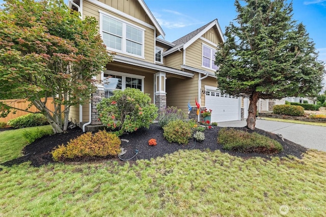 22418 SE 281st St, Maple Valley, WA 98038 - craftsman house with board and batten siding, concrete driveway, and an attached garage