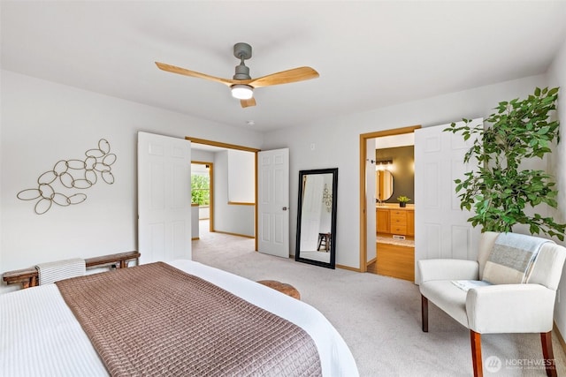 22418 SE 281st St, Maple Valley, WA 98038 - bedroom featuring light carpet, connected bathroom, and a ceiling fan
