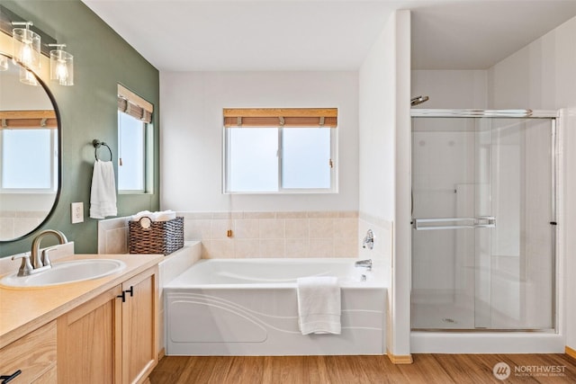 22418 SE 281st St, Maple Valley, WA 98038 - bathroom featuring a shower stall, a garden tub, and vanity