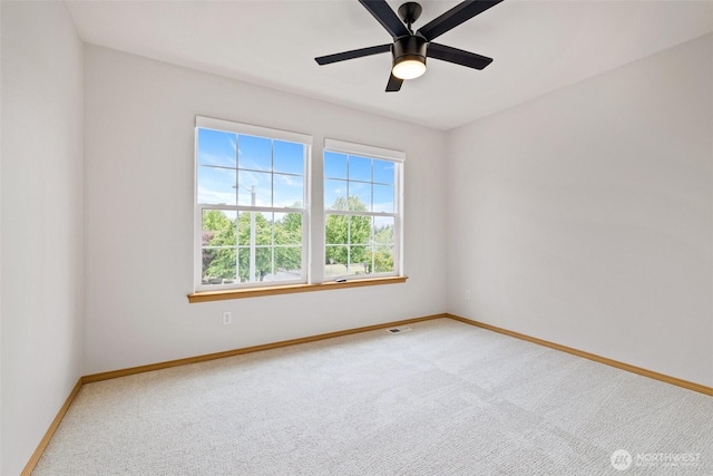 22418 SE 281st St, Maple Valley, WA 98038 - carpeted empty room featuring baseboards and a ceiling fan