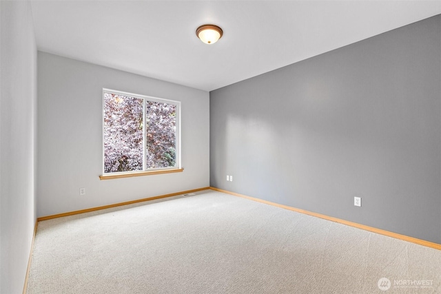 22418 SE 281st St, Maple Valley, WA 98038 - spare room with carpet flooring and baseboards