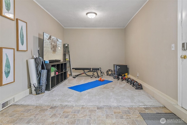 3041 S 201st St, Seatac, WA 98198 - exercise room featuring crown molding and stone finish flooring