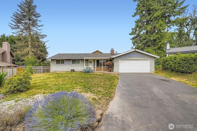202 Elma Pl SE, Renton, WA 98059 - ranch-style home featuring an attached garage, driveway, and covered porch