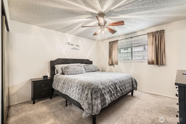 202 Elma Pl SE, Renton, WA 98059 - bedroom featuring carpet floors, a textured ceiling, and a ceiling fan