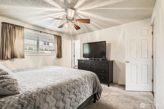 202 Elma Pl SE, Renton, WA 98059 - bedroom with light carpet, a textured ceiling, and ceiling fan