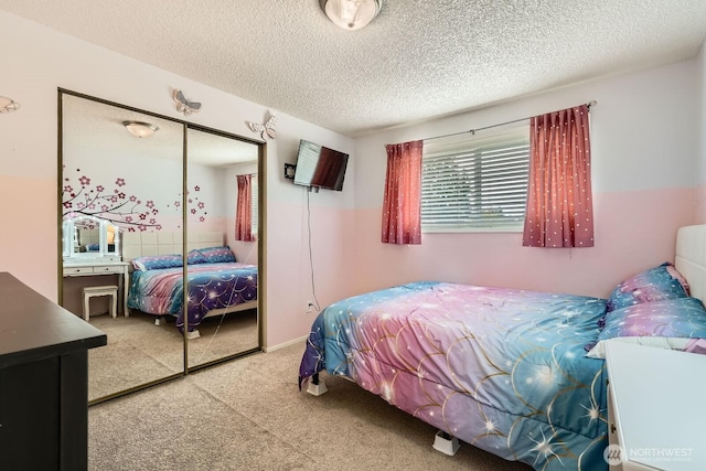 202 Elma Pl SE, Renton, WA 98059 - bedroom with carpet, a closet, and a textured ceiling
