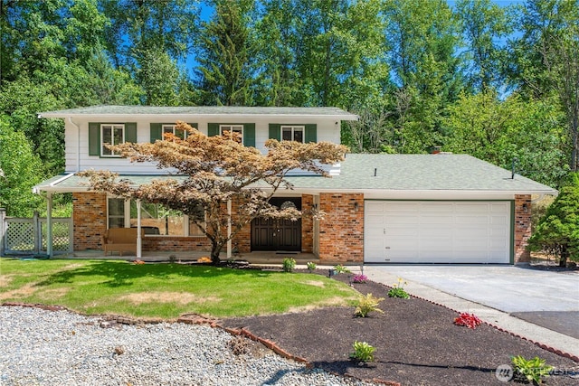 29701 52nd Ave E, Graham, WA 98338 - view of front of house with an attached garage, driveway, brick siding, and a porch