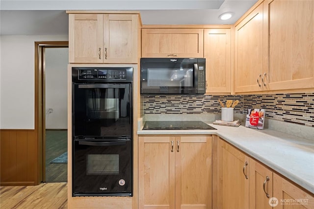 29701 52nd Ave E, Graham, WA 98338 - kitchen with light brown cabinets, black appliances, tasteful backsplash, and light wood-style floors