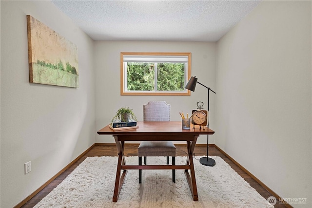 29701 52nd Ave E, Graham, WA 98338 - home office with a textured ceiling and wood finished floors