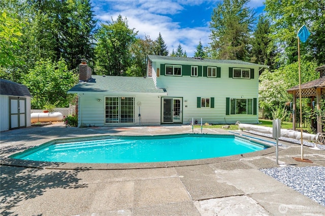 29701 52nd Ave E, Graham, WA 98338 - outdoor pool with a patio and a shed