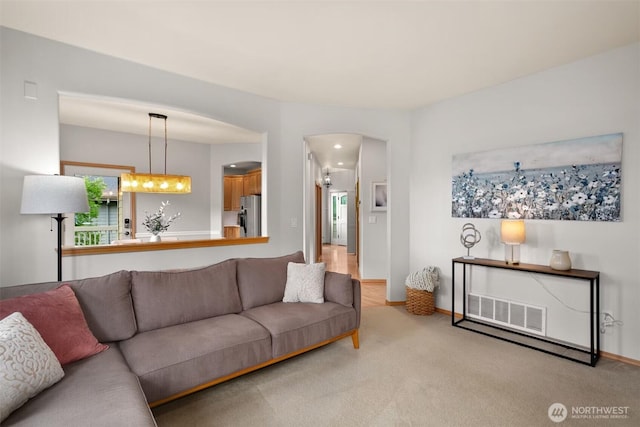 8233 NE 163rd Pl, Kenmore, WA 98028 - living area featuring arched walkways and light carpet