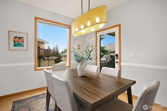 8233 NE 163rd Pl, Kenmore, WA 98028 - dining room featuring wood finished floors and healthy amount of natural light