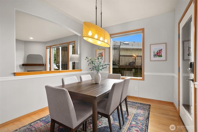 8233 NE 163rd Pl, Kenmore, WA 98028 - dining area featuring wood finished floors and baseboards