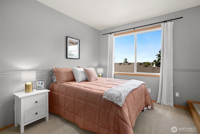 8233 NE 163rd Pl, Kenmore, WA 98028 - bedroom featuring light colored carpet and baseboards