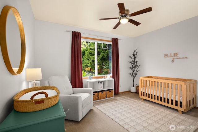 8233 NE 163rd Pl, Kenmore, WA 98028 - bedroom featuring a nursery area and a ceiling fan