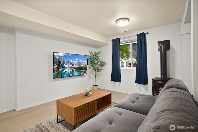 8233 NE 163rd Pl, Kenmore, WA 98028 - living room with a wood stove and light colored carpet