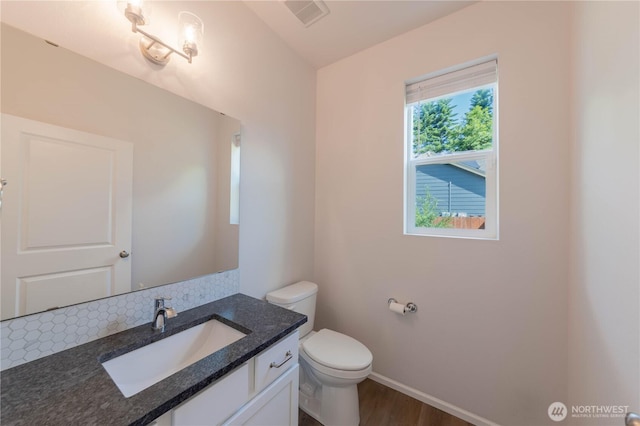 514 Wellington Pl, Sedro Woolley, WA 98284 - half bathroom with vanity and wood finished floors