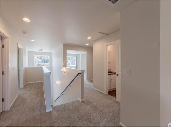 514 Wellington Pl, Sedro Woolley, WA 98284 - hallway with an upstairs landing, carpet, and recessed lighting