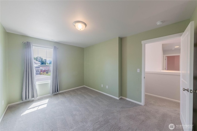 514 Wellington Pl, Sedro Woolley, WA 98284 - carpeted spare room featuring a smoke detector and baseboards