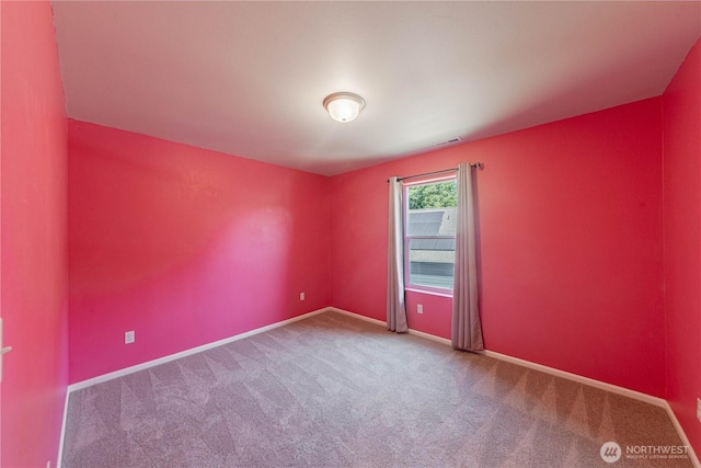 514 Wellington Pl, Sedro Woolley, WA 98284 - carpeted spare room featuring baseboards