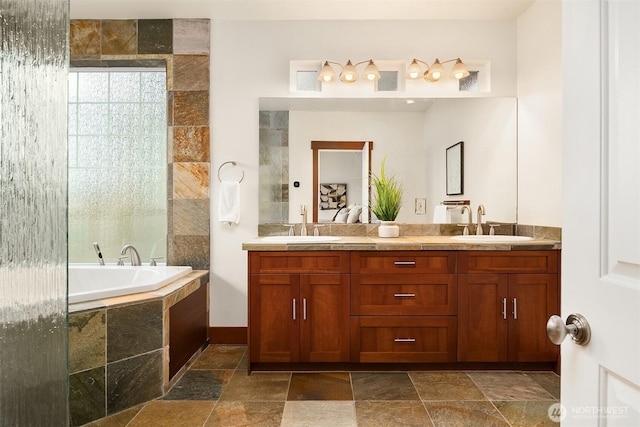 10904 W Lake Joy Dr NE, Carnation, WA 98014 - full bath with a bath, stone tile floors, and double vanity