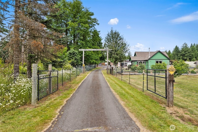 1241 Koontz Rd, Chehalis, WA 98532 - view of asphalt driveway featuring a gated entry