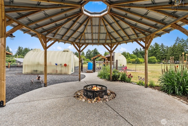 1241 Koontz Rd, Chehalis, WA 98532 - view of patio / terrace with an outdoor fire pit