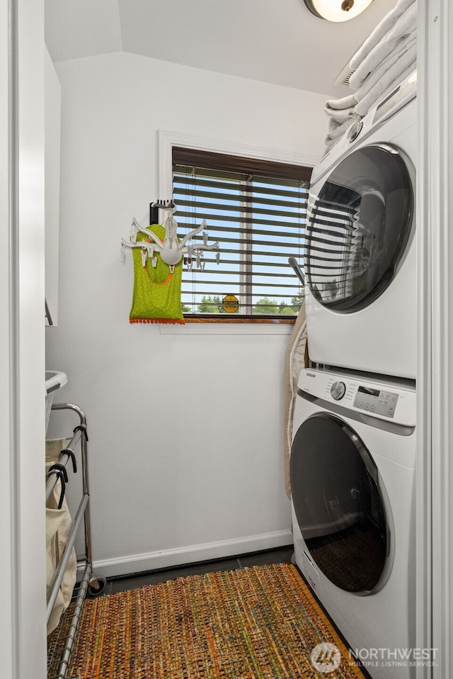 1241 Koontz Rd, Chehalis, WA 98532 - laundry area featuring stacked washer / drying machine and baseboards