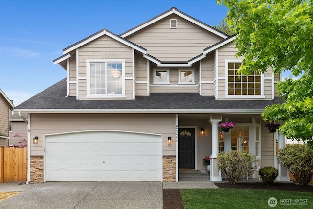 18022 29th Ave SE, Bothell, WA 98012 - view of front of property with stone siding, concrete driveway, roof with shingles, and a porch