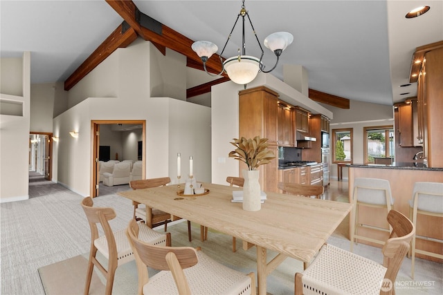 1409 Marietta Ave, Bellingham, WA 98226 - dining room featuring light carpet and a chandelier